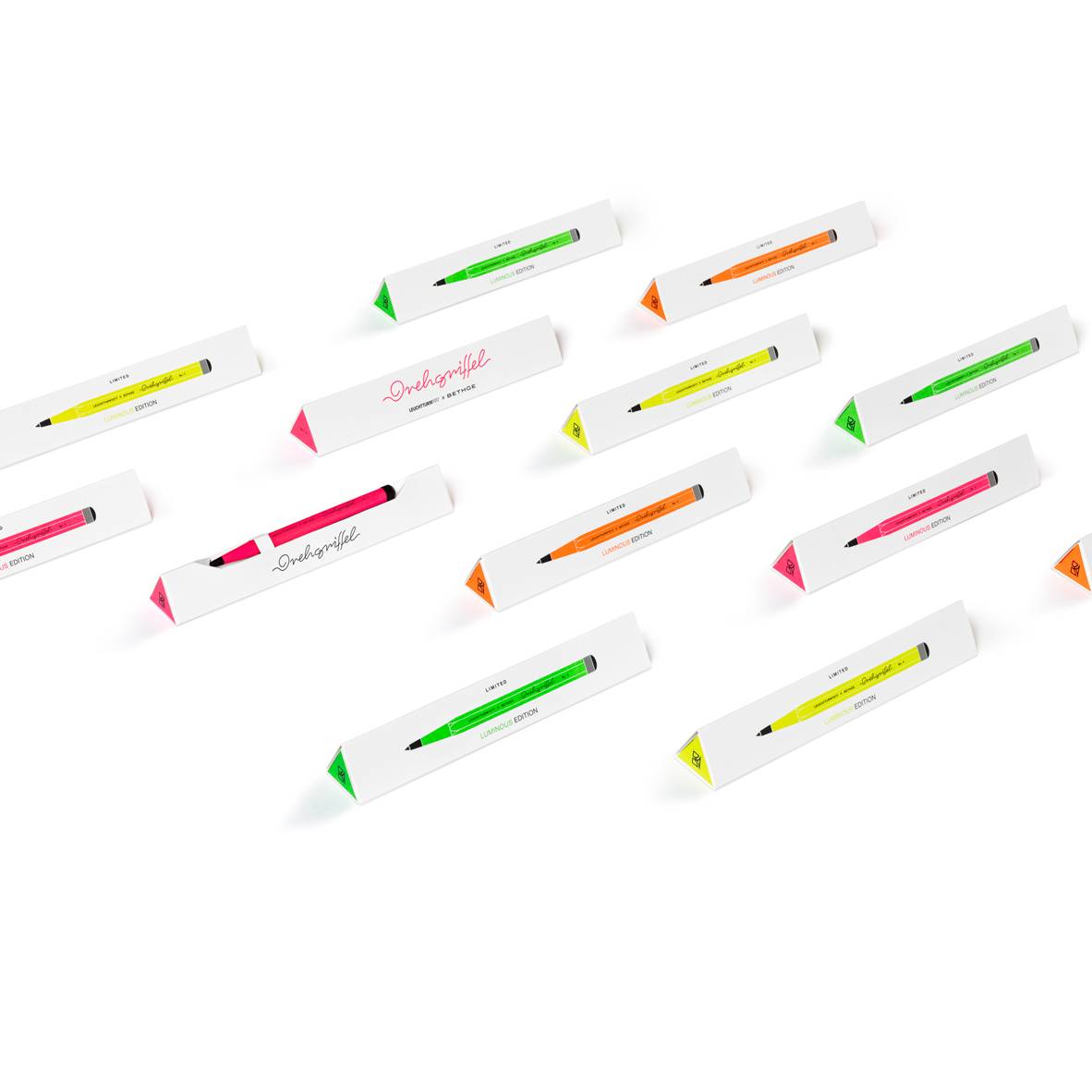 Leuchtturm1917 × Bethge Drehgriffel Nr. 1 Luminous Edition Ballpoint Pen in neon colors with black accents.