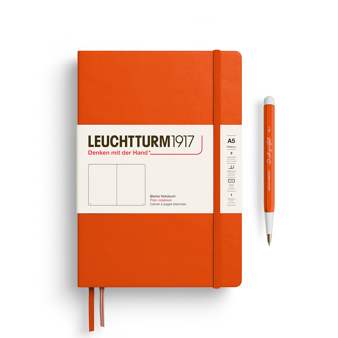 Leuchtturm1917 A5 Medium Hardcover Notebook in Pumpkin orange with plain pages for sketching and creative notes.