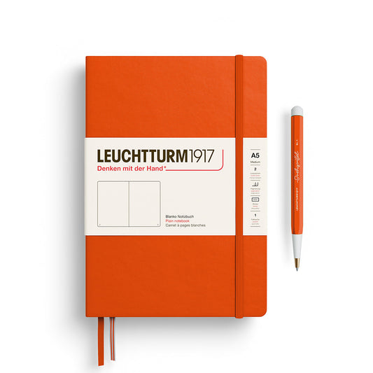 Leuchtturm1917 A5 Medium Hardcover Notebook in Pumpkin orange with plain pages for sketching and creative notes.