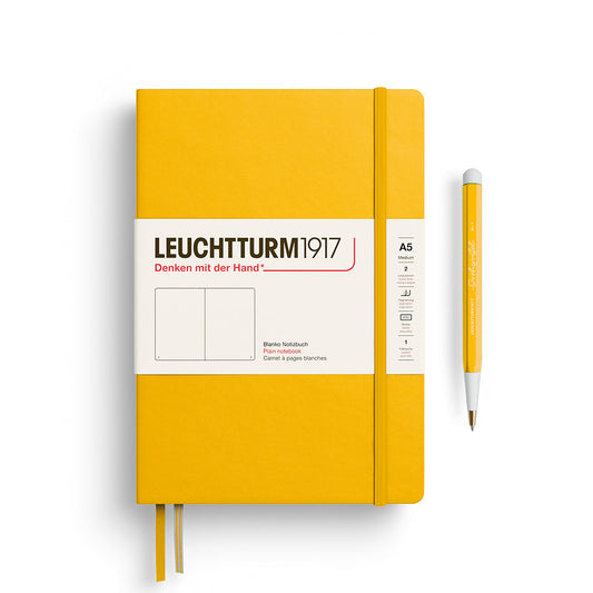 Leuchtturm1917 A5 Medium Hardcover Notebook in Sunflower yellow with plain pages for journaling and drawing.