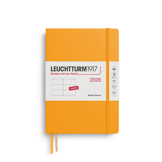 Leuchtturm1917 A5 Medium Hardcover Weekly Planner 2026 in rising sun, featuring a minimalist weekly layout and elastic closure band, ideal for everyday organization.