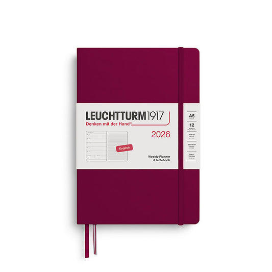 Leuchtturm1917 A5 Medium Hardcover Weekly Planner & Notebook 2026 in port red, featuring a sleek, minimalist design with an elastic closure band.