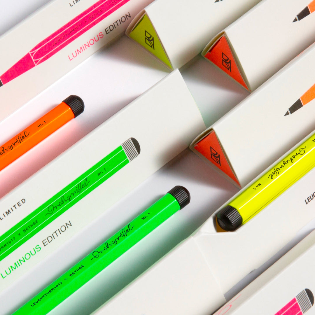 Leuchtturm1917 × Bethge Drehgriffel Nr. 1 Luminous Edition Ballpoint Pen in neon colors with black accents.