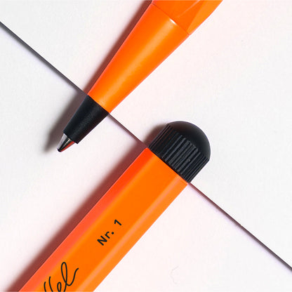 Leuchtturm1917 × Bethge Drehgriffel Nr. 1 Luminous Edition Ballpoint Pen in neon orange with black accents.
