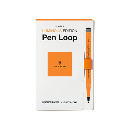 Leuchtturm1917 × Bethge Luminous Edition Pen Loop in neon orange with elastic holder.