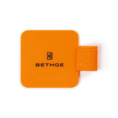 Leuchtturm1917 × Bethge Luminous Edition Pen Loop in neon orange with elastic holder.